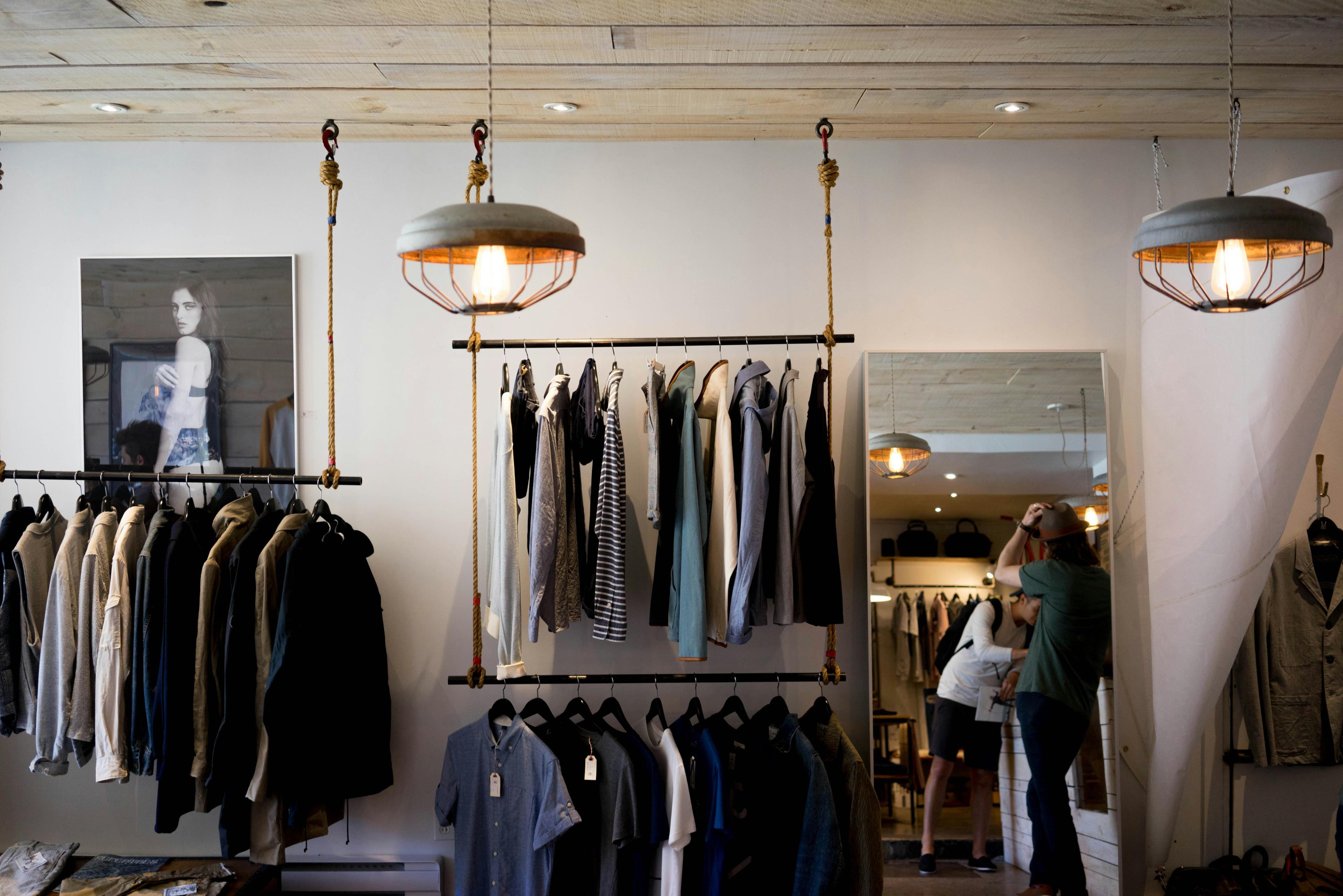 A sparse rail of neutral garments